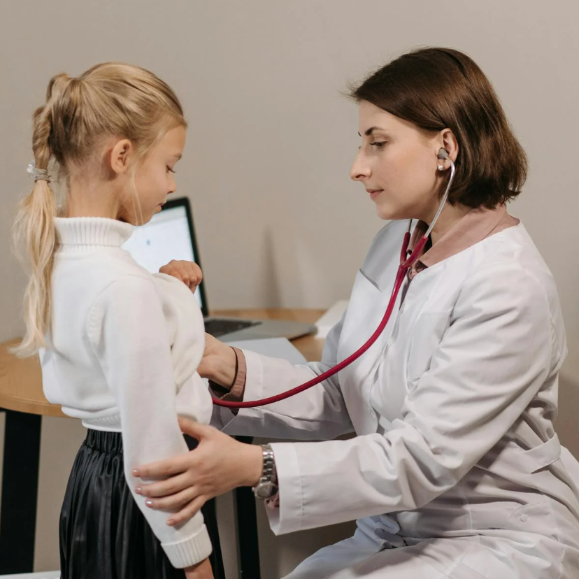 Child with doctor | Credit: Pexels