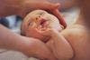 Holding Infants During Blood Test Reduces Pain