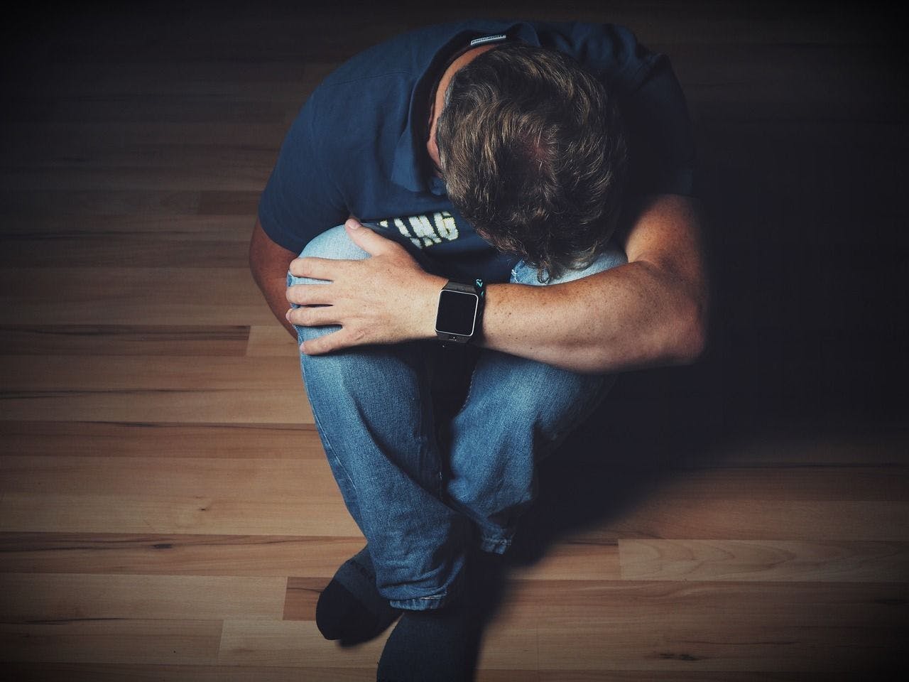 Phase 2 SAVITRI Supports Use of NBI-1065845 in Major Depressive Disorder with Inadequate Response to Antidepressants ||| Depressed man on floor. | Credit: HolgersFotografie | Pixabay